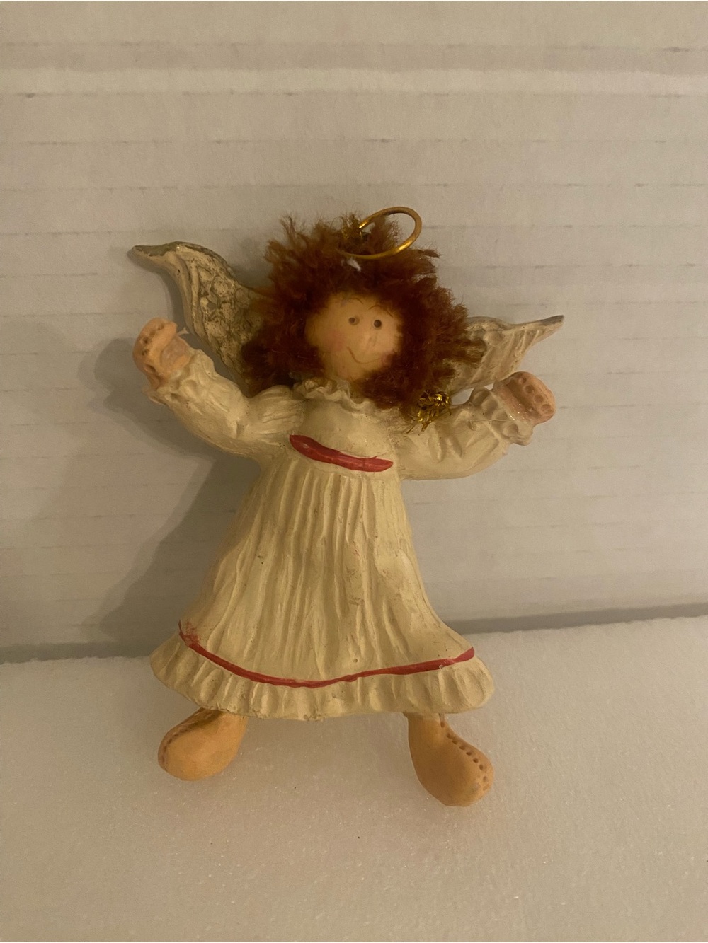 Kurt Adler Cream Angel Ornament with Red Trim and Brown Hair